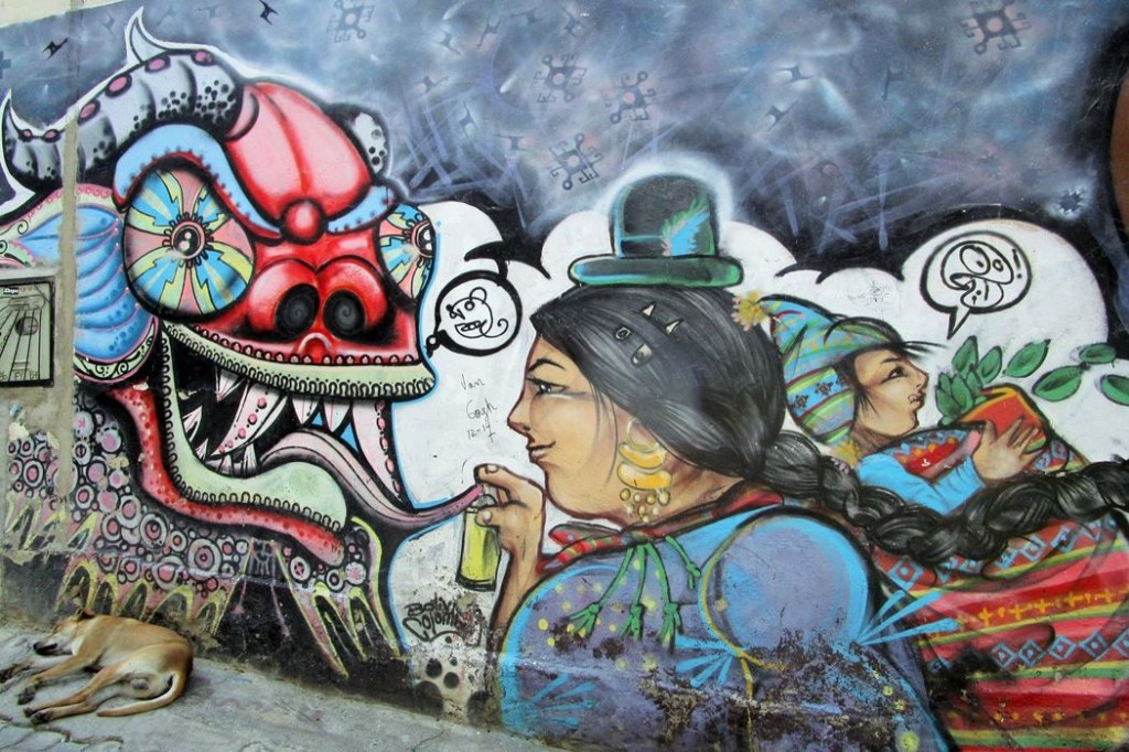 Street-art sur un mur de La Paz en Bolivie, où un chien dort